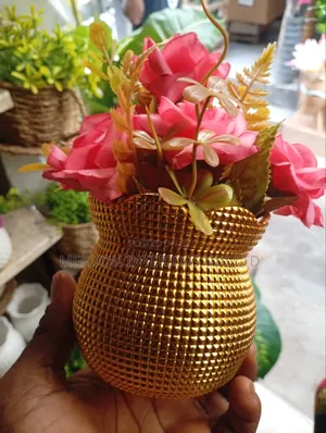 Golden Vase With a Beautiful Flower