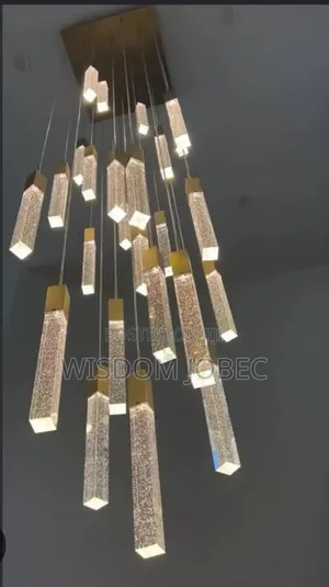 Multi-Drop Crystal and Brass Pendant Light Fixture.