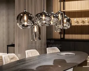 These Are Smoked Glass Multi-Light Pendant Chandeliers