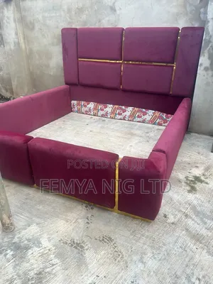 A Modern 6 × 6 Ft Upholstered Bed Featuring a Stylish,