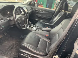 Honda Pilot Touring 4dr SUV 4WD (3.5L 6cyl 9A) 2016 Black