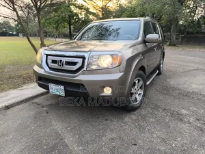 Honda Pilot EX-L 4dr SUV 4WD (3.5L 6cyl 5A) 2009 Gold