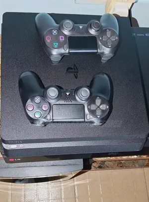 HACKED PS4 SLIM With 15-Games, FC-27, Gta 5, MK-11, Watch Dogs-2, COD.