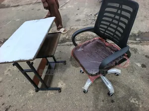 Adjustable Computer Table and Swivel Chair.
