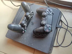 PS4 Slim Console and 2 Pads