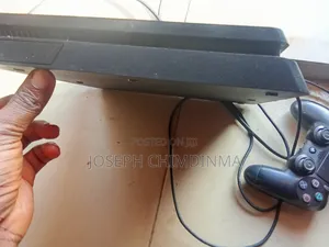 PS4 Slim Console and 2 Pads