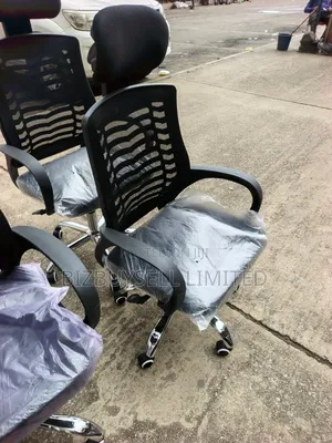 Ergonomic Mesh Office Chair With a Headrest (Often Called a Victory .