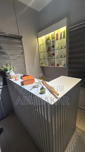 High Gloss Reception Cubicle and Display Shelf With Glass and Light.