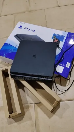 Ps4 Slim With Carton and Accessories With 10 Latest Games Installed