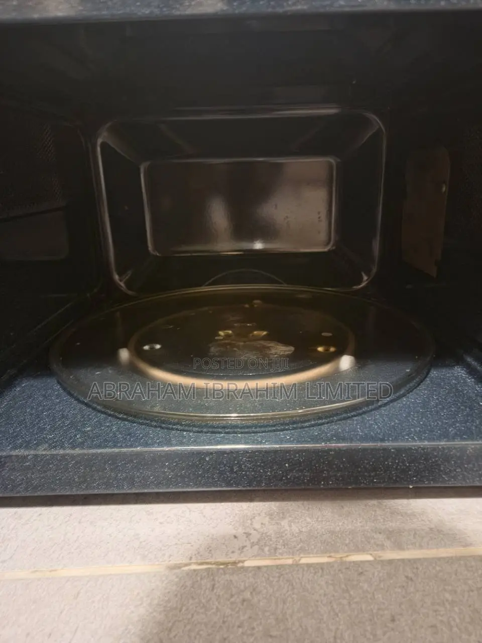 Used Black Samsung Microwave Oven