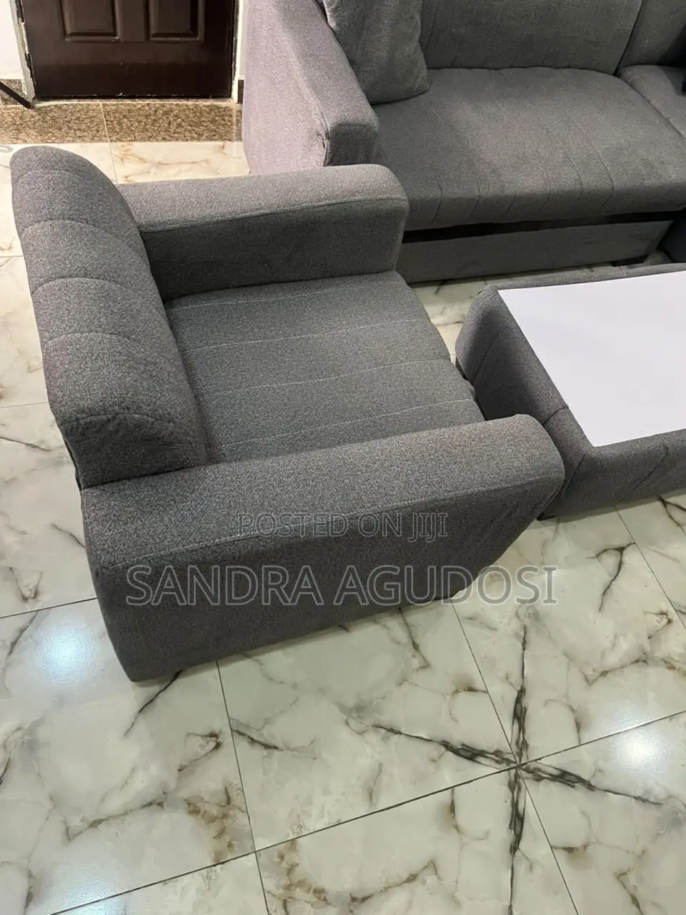 L-Shaped Sofa With Single Chair and Center Table