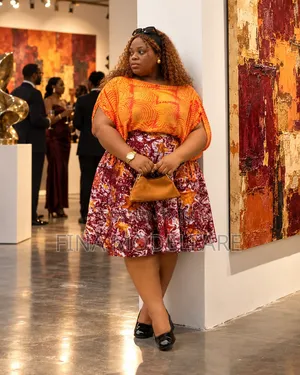 ỌKỤ (Fire You Can Wear.)