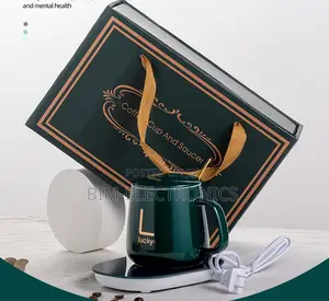 Mug With Warmer and a Spoon.