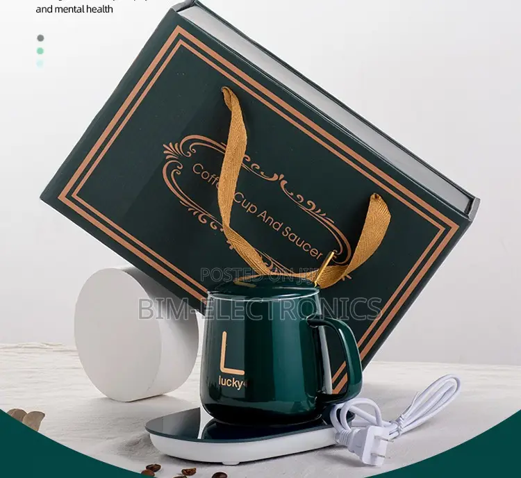 Mug With Warmer and a Spoon.