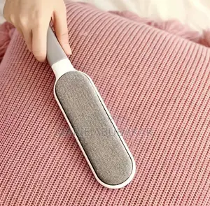 A Double-Sided Manual Dust Brush Designed for Shedding & Grooming Dogs