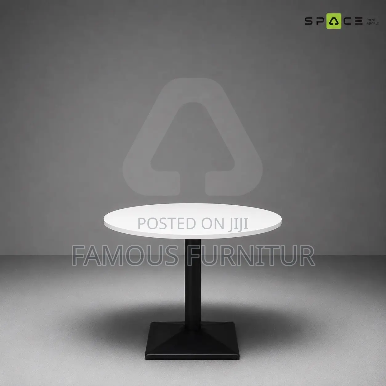 Modern Round Pedestal Restaurant Table With a White Top Square Base.