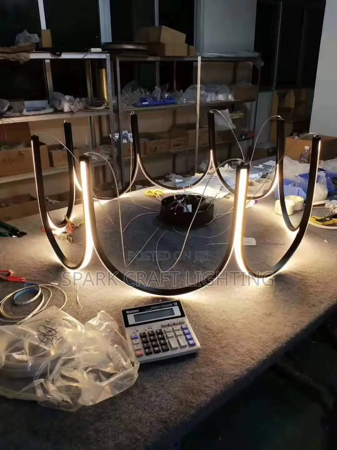 Luxury Modern LED Loop Chandelier – Black & Gold