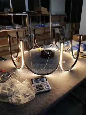 Luxury Modern LED Loop Chandelier – Black & Gold