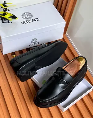 Men's Versace Leather Penny Loafers With Black Sole