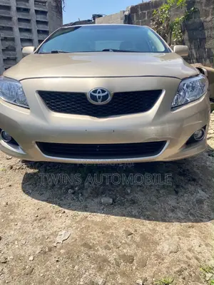 Toyota Corolla LE 4dr Sedan (1.8L 4cyl 4A) 2010 Gold