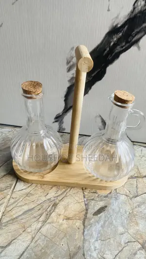 2-Piece Glass Oil and Vinegar Dispenser Set With a Wooden Stand