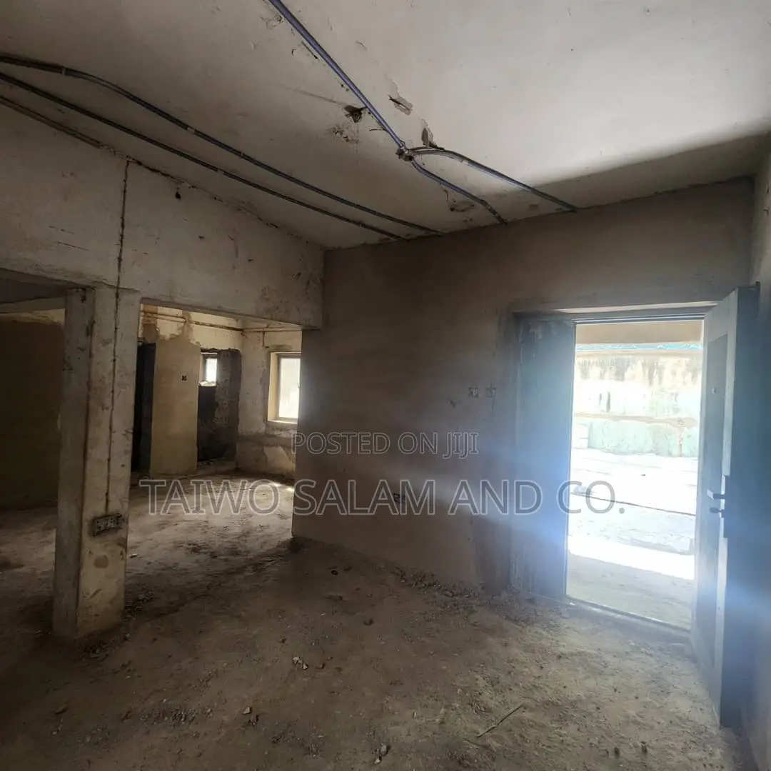 A Two Storey Office Complex With a Shop