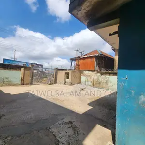 A Two Storey Office Complex With a Shop