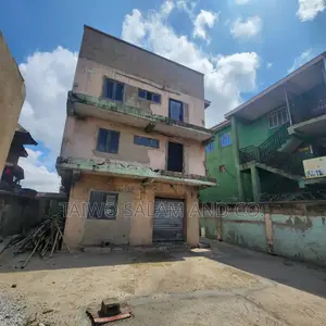 A Two Storey Office Complex With a Shop