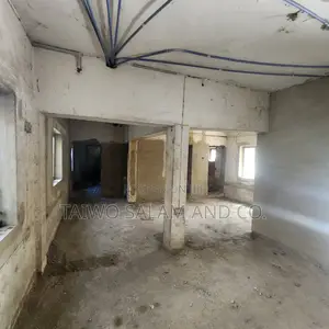 A Two Storey Office Complex With a Shop