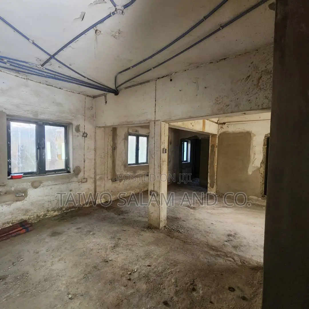 A Two Storey Office Complex With a Shop