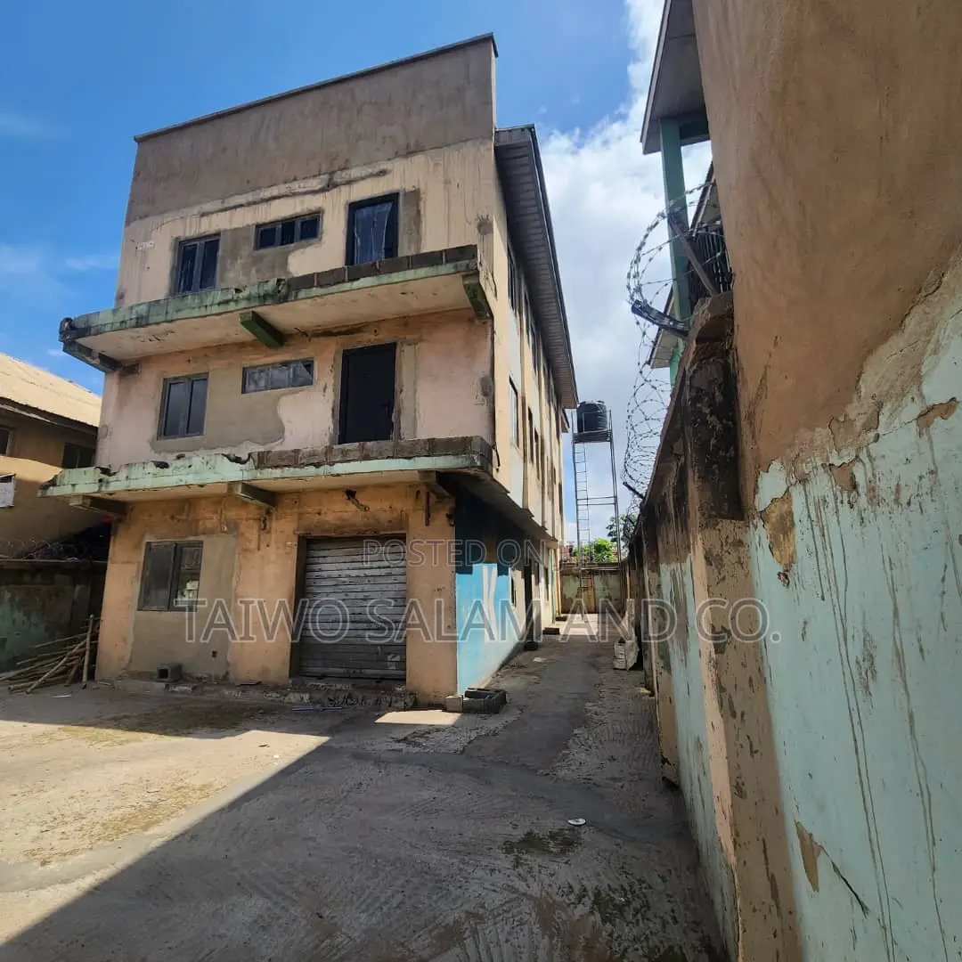 A Two Storey Office Complex With a Shop