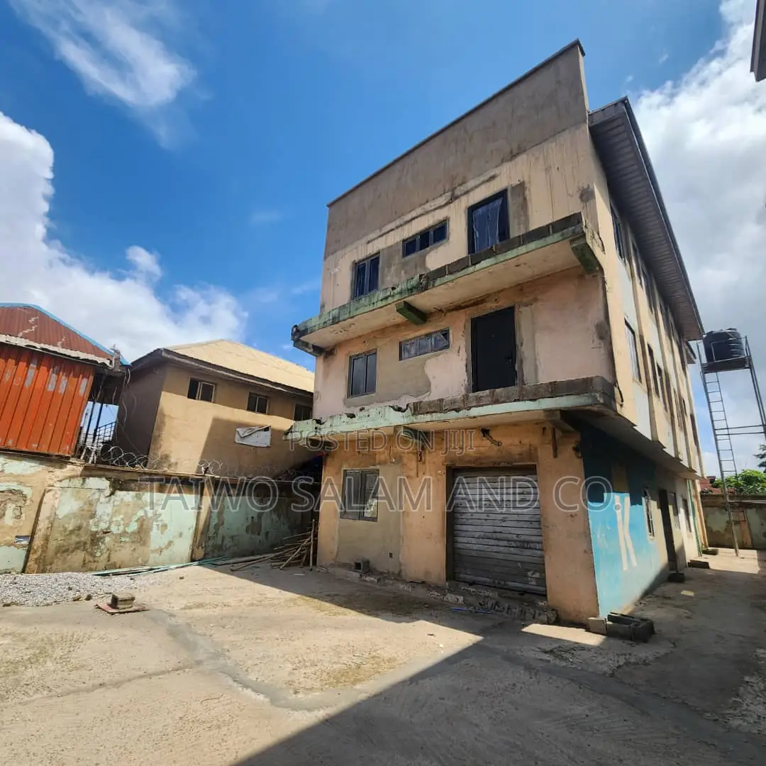 A Two Storey Office Complex With a Shop