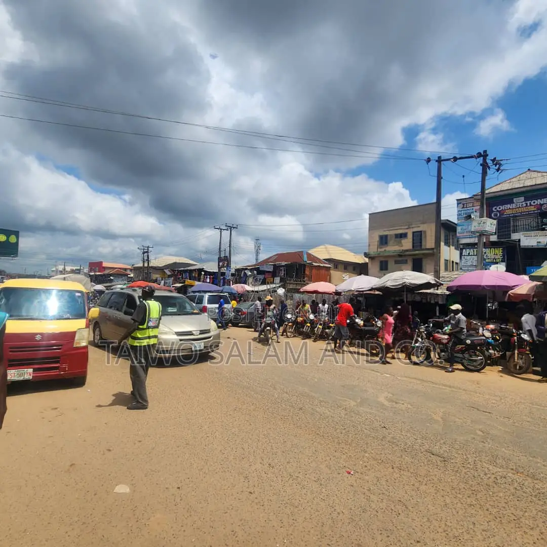 A Two Storey Office Complex With a Shop