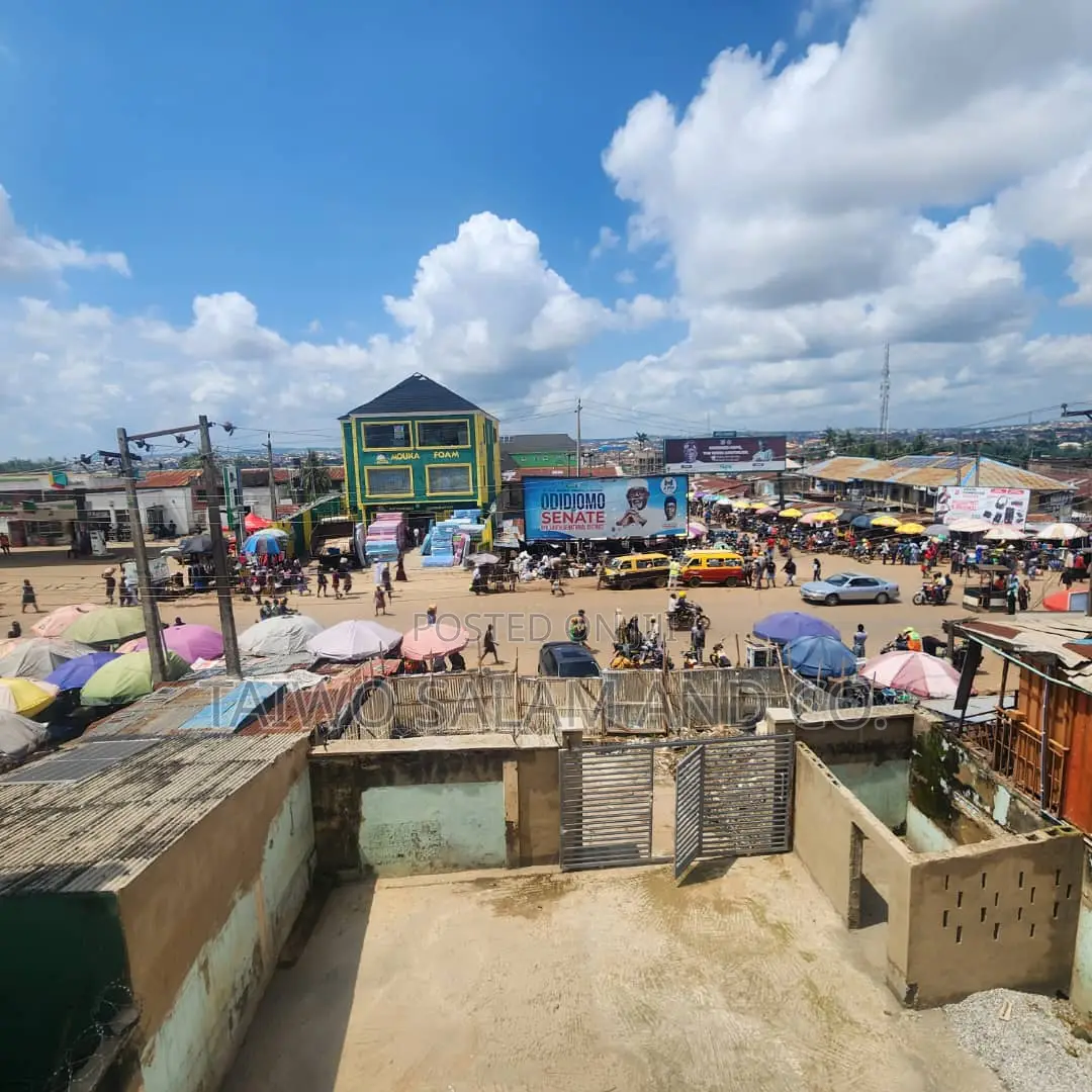 A Two Storey Office Complex With a Shop