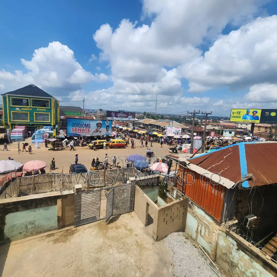 A Two Storey Office Complex With a Shop