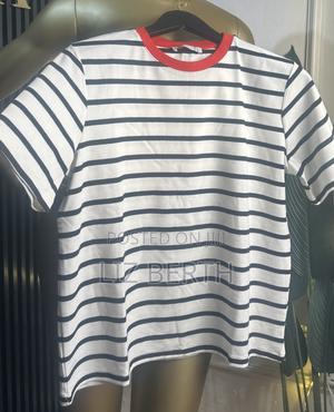 Women’s Striped Polo Top