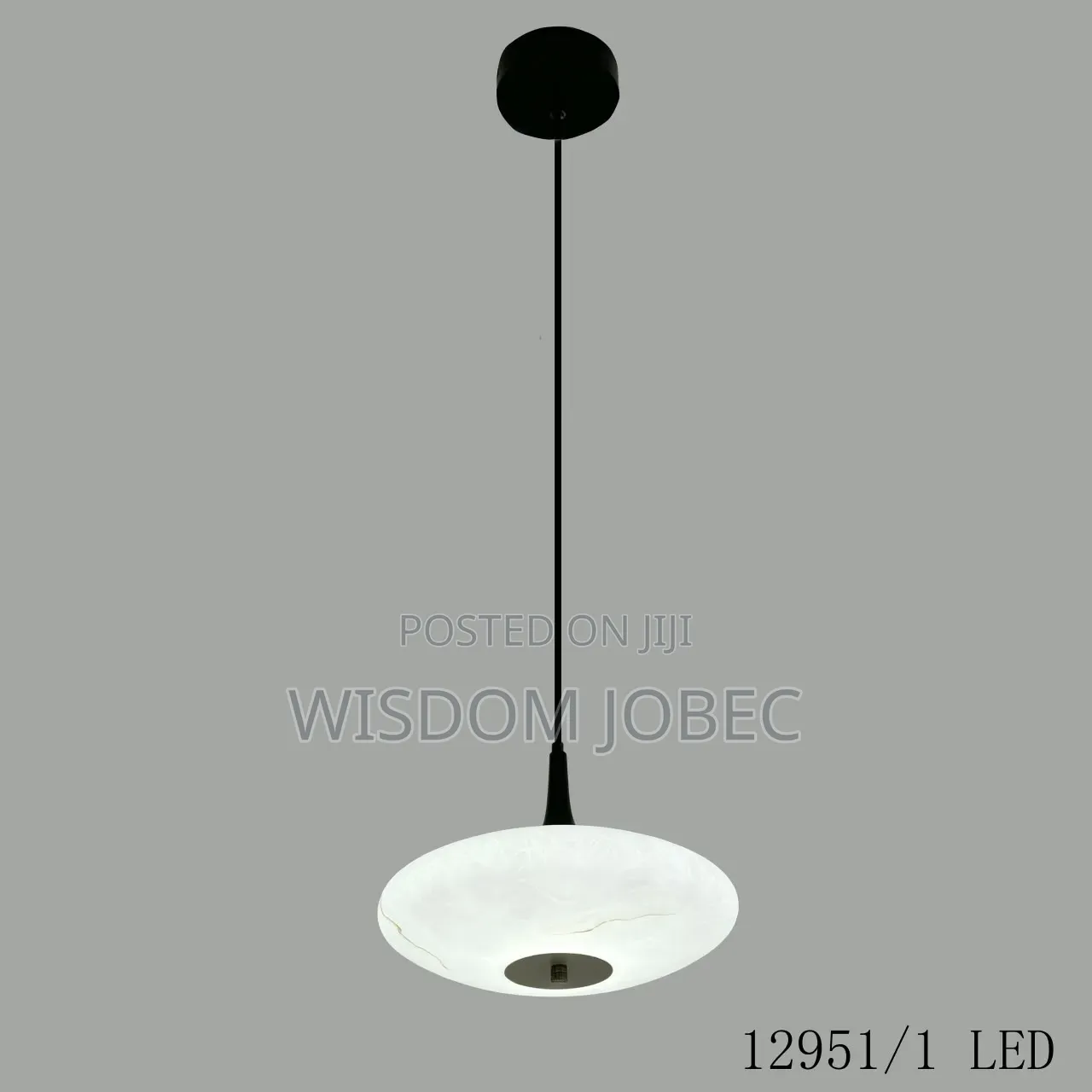 Modern Saucer-Shaped or Disc-Style Pendant Light Featuring