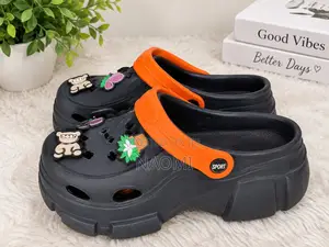 Black Crocs With Charms
