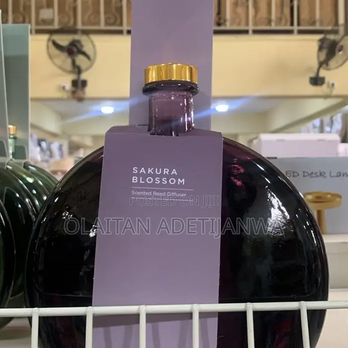 Scented Reed Diffuser With a Gold-Toned Cap.
