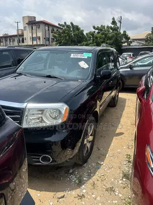 Honda Pilot Touring w/RES/Navi 4WD (3.5L 6cyl 5A) 2013 Black