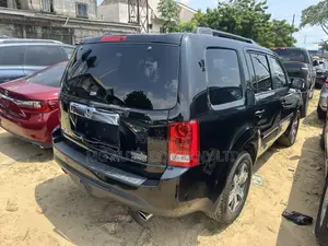 Honda Pilot Touring w/RES/Navi 4WD (3.5L 6cyl 5A) 2013 Black
