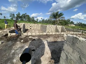 50x100ft Land in Agbarho With Foundation.