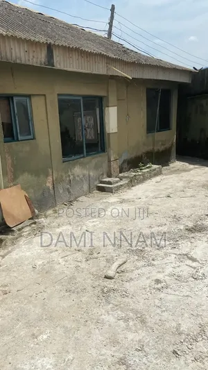 A Piece of Land 42feet by 20feet by 29feet by 52feet