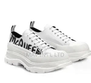 Alexander McQueen Tread Slick Low-Top Sneakers in the White and Black