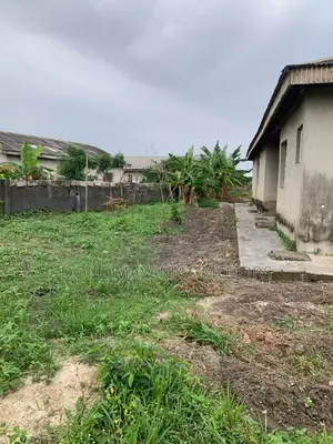 3 and Half Plot of Land at Oreta Igbogbo Ikorodu,with a Structure Onit