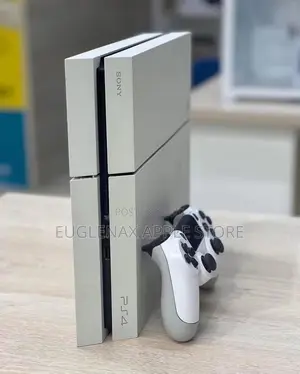 Uk Used PS4 Fat With One Pad and 10 Games