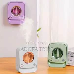 Sensor Night Aromatherapy Diffuser With a Bottle of Humidifier Oil.
