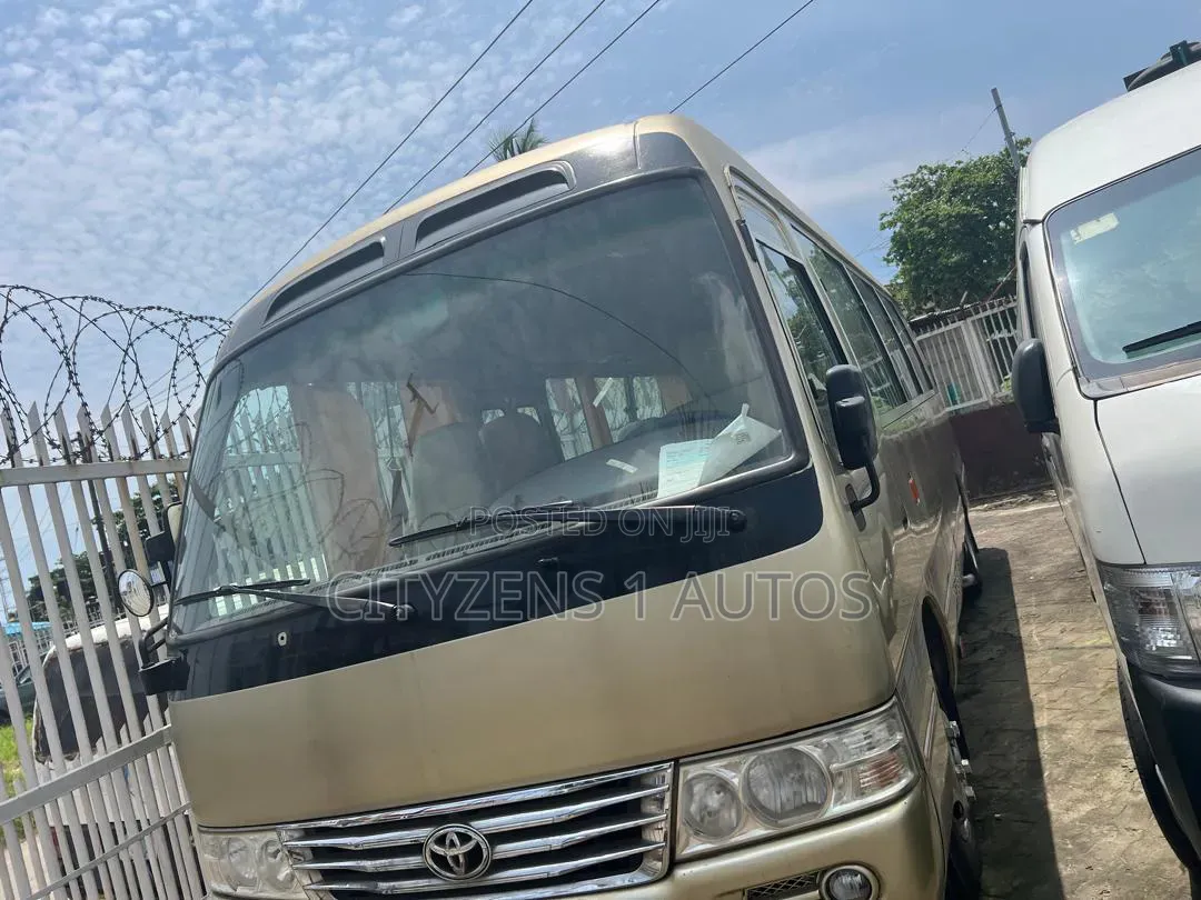 Toyota Coaster 2012 Gold