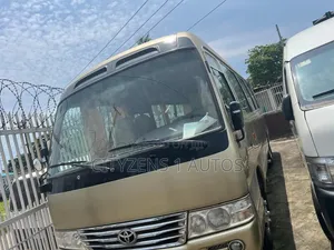 Toyota Coaster 2012 Gold