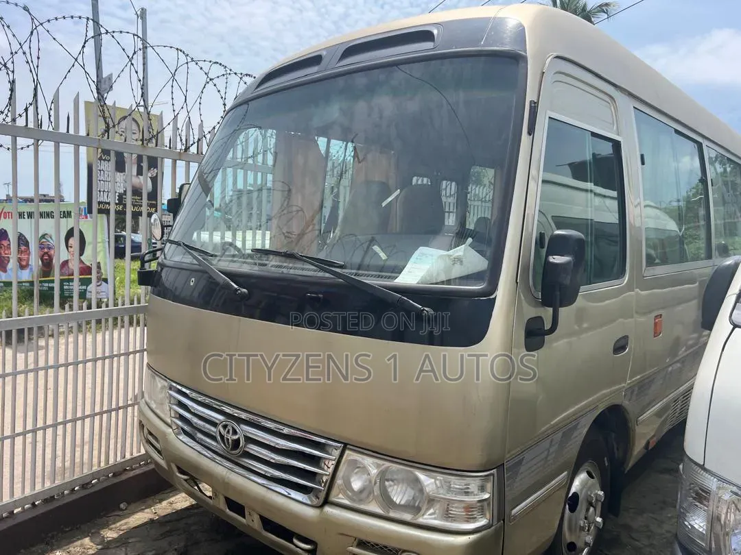 Toyota Coaster 2012 Gold